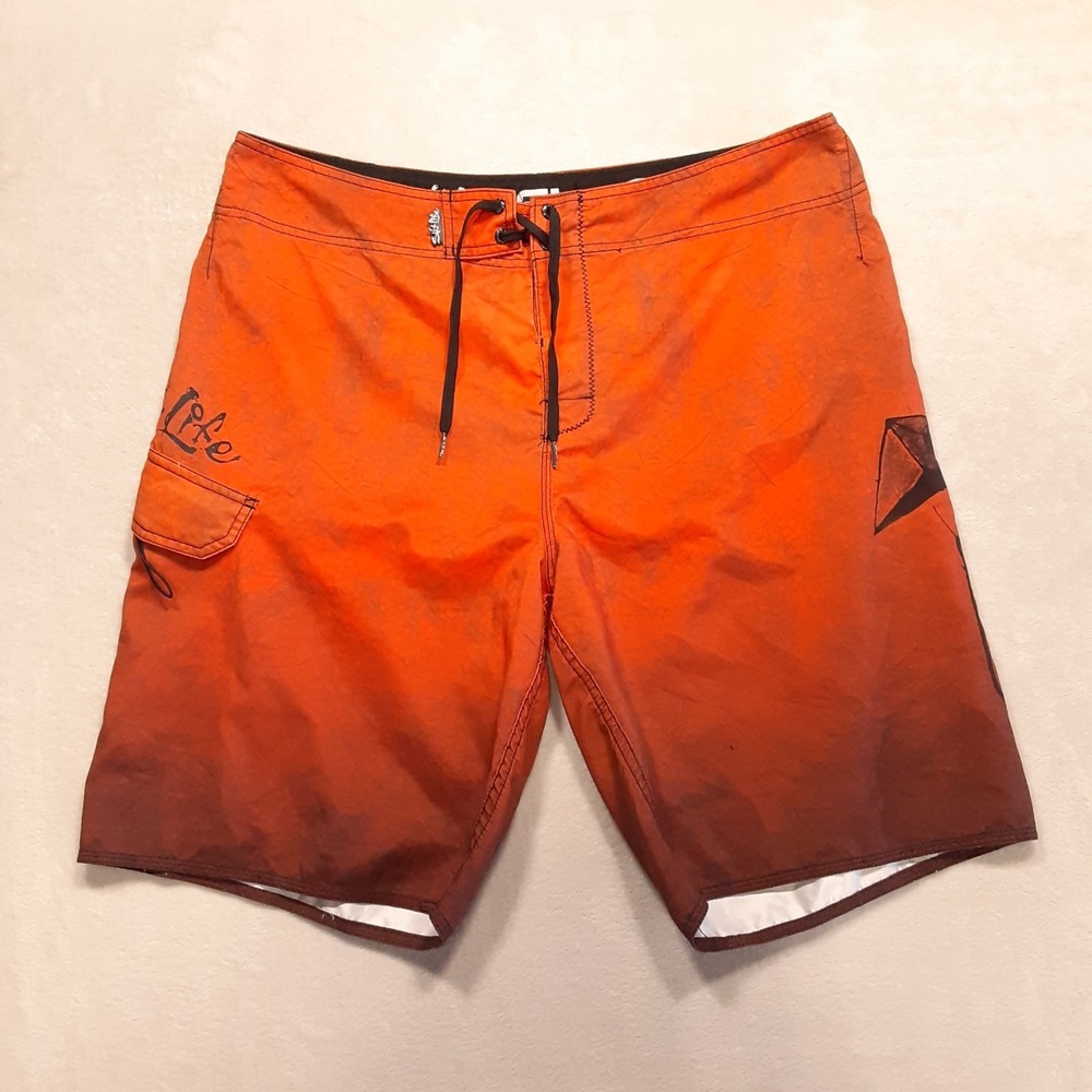 Salt Life Mens SLX-QD Stealth Bomber Shorts 38 Orange Gradient Weight Hook